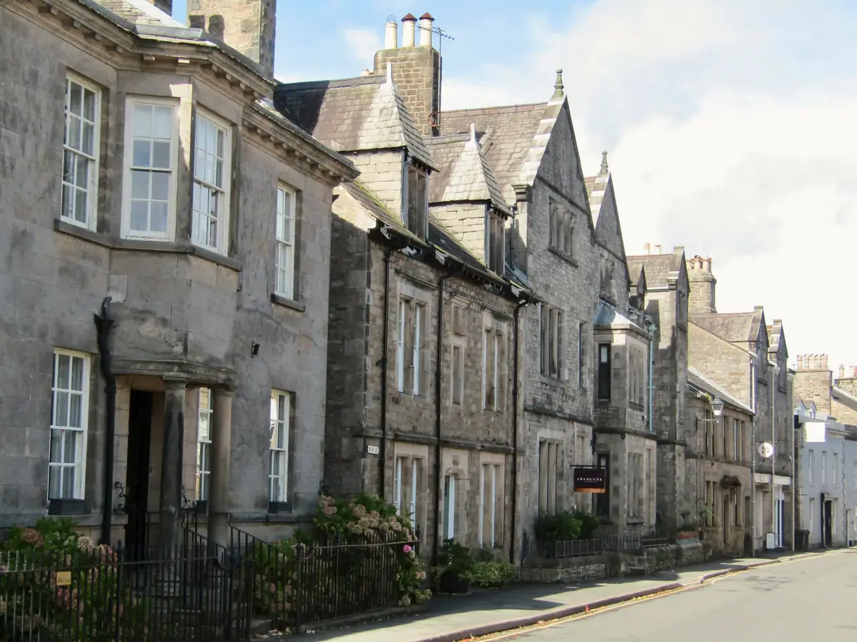 Georgian and Victorian stone houses lining Main Street in Kirkby Lonsdale